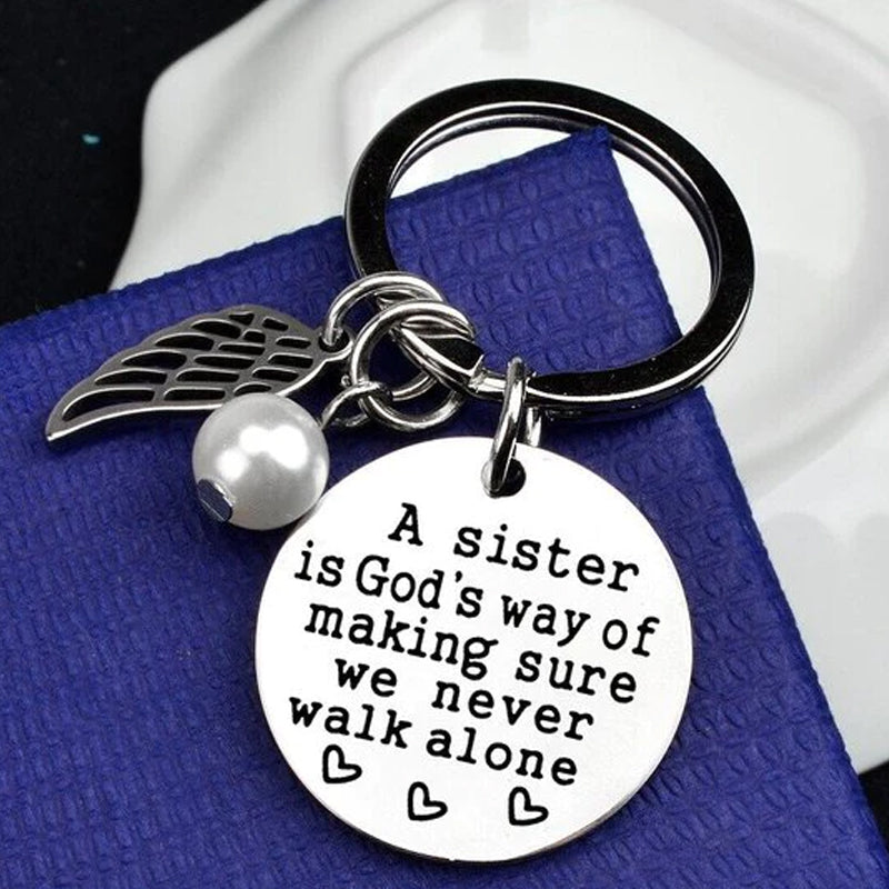 A Sister is God's Way of Making Sure We Never Walk Alone Keychain